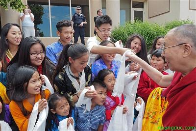 Dalai Lama and young kid 11