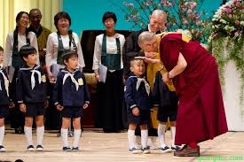 Dalai Lama and young kid 5